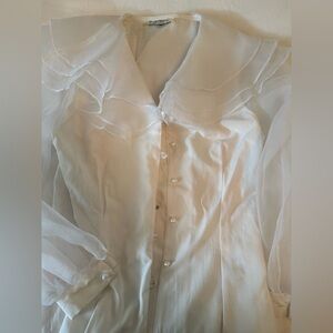 Le Chateau Vintage White Blouse with pearl-like buttons.